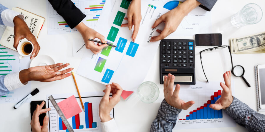 businessmen hands white table with documents drafts